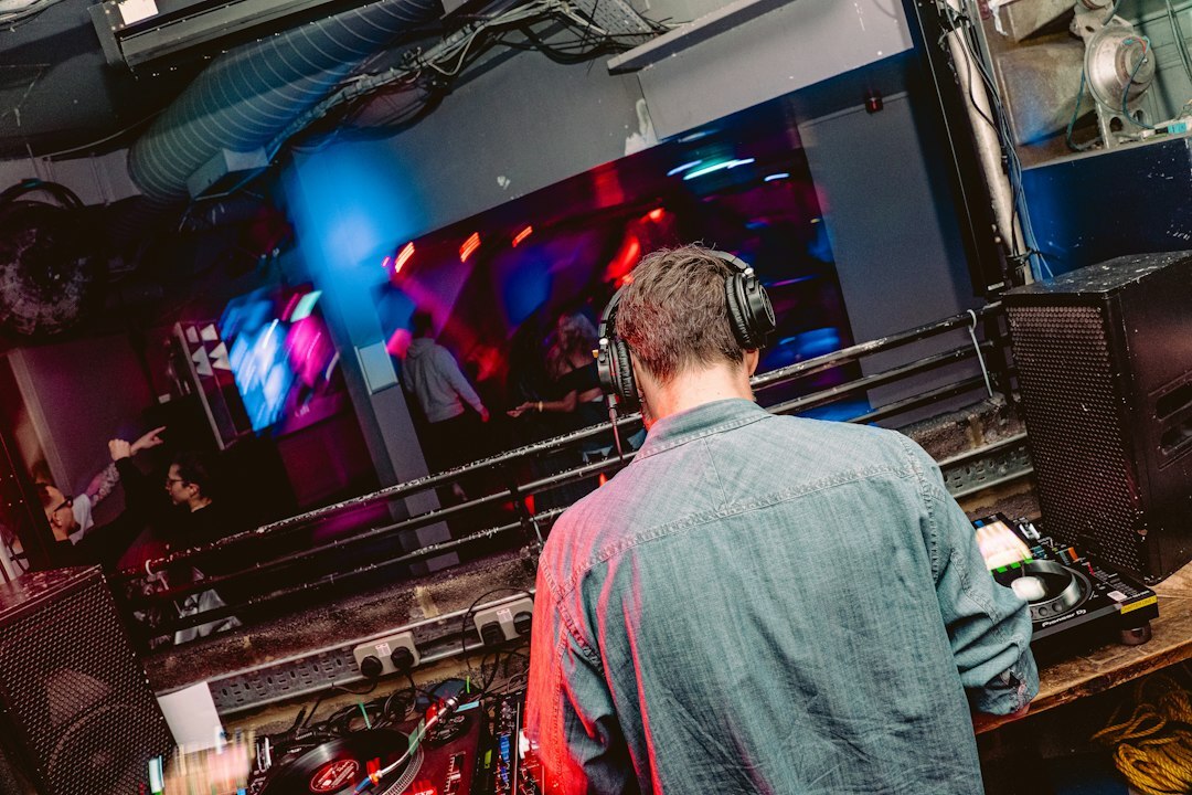 Broadcast director watching live monitors
